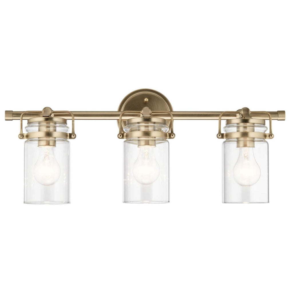 Kichler, Brinley 24" 3 Light Vanity Light with Clear Glass in Champagne Bronze,
